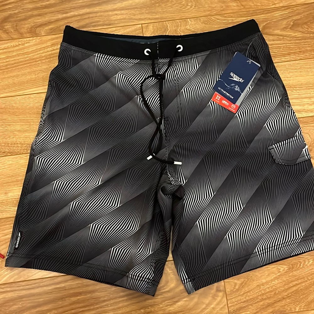 Speedo swim board shorts. Size 34. Black patterned.